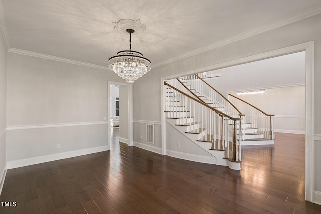 1475 Sierra Glen Cir, Apex, NC 27502 - unfurnished dining area featuring a chandelier, stairs, hardwood / wood-style flooring, baseboards, and crown molding