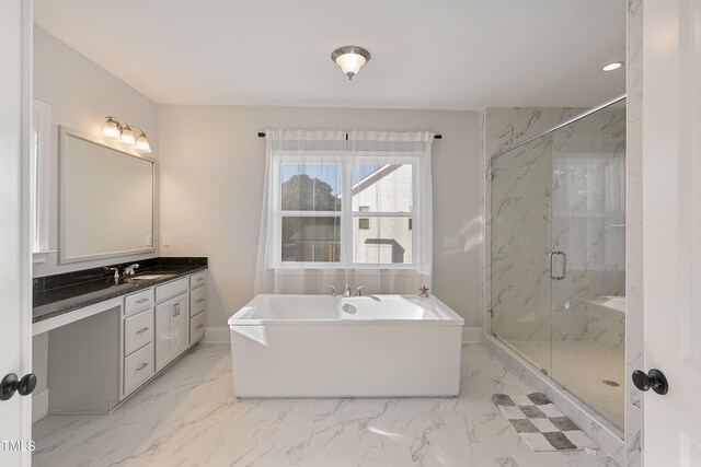 1475 Sierra Glen Cir, Apex, NC 27502 - bathroom featuring a freestanding bath, vanity, a marble finish shower, marble finish floors, and recessed lighting