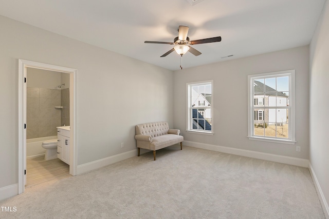 1475 Sierra Glen Cir, Apex, NC 27502 - sitting room featuring light colored carpet, baseboards, and ceiling fan