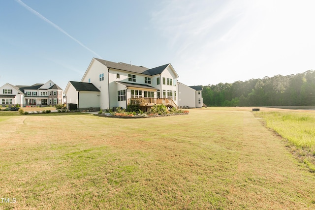 1475 Sierra Glen Cir, Apex, NC 27502 - rear view of property featuring a wooden deck and a yard