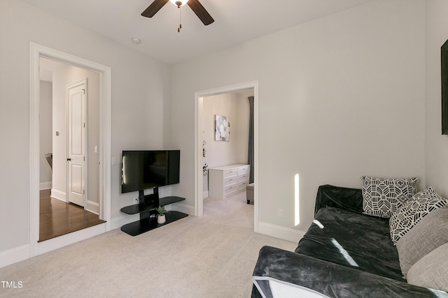 1475 Sierra Glen Cir, Apex, NC 27502 - living area featuring carpet, a ceiling fan, and baseboards