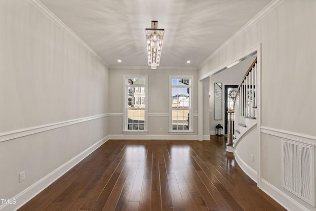 1475 Sierra Glen Cir, Apex, NC 27502 - unfurnished dining area with a chandelier, stairway, baseboards, wood-type flooring, and crown molding