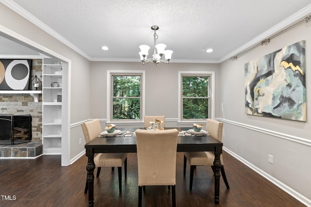 821 Stoneybrook Dr, Sanford, NC 27330 - dining space featuring a chandelier, dark wood-type flooring, a textured ceiling, plenty of natural light, and ornamental molding