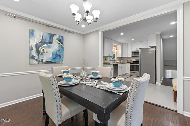 821 Stoneybrook Dr, Sanford, NC 27330 - dining space with a chandelier, recessed lighting, wood finished floors, crown molding, and baseboards