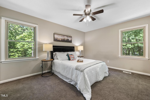 821 Stoneybrook Dr, Sanford, NC 27330 - carpeted bedroom with baseboards and a ceiling fan