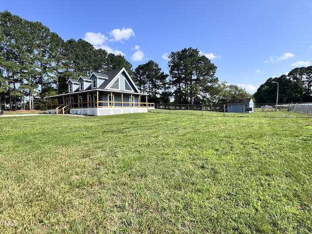 1283 Ennis Rd, Angier, NC 27501 - view of yard with a sunroom
