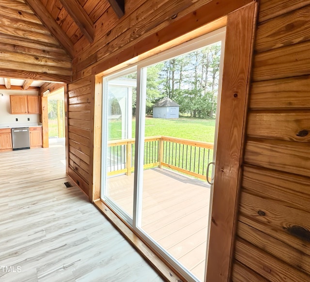 1283 Ennis Rd, Angier, NC 27501 - doorway to outside with wood ceiling, plenty of natural light, light wood-type flooring, and wooden walls
