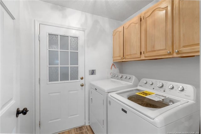 1266 Exeter Ln, Fayetteville, NC 28314 - laundry area featuring washer and clothes dryer and cabinet space