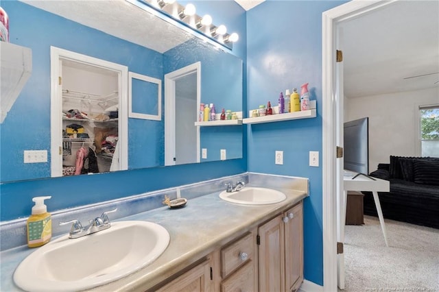 1266 Exeter Ln, Fayetteville, NC 28314 - full bathroom featuring double vanity and a spacious closet
