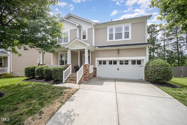 1211 Whispering Oak Ln, Durham, NC 27704 - view of front of home with a porch, driveway, and an attached garage