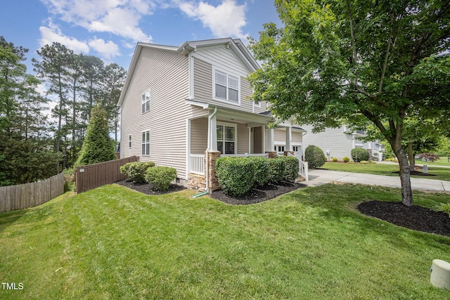 1211 Whispering Oak Ln, Durham, NC 27704 - view of side of property with a porch