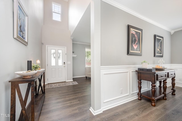 1211 Whispering Oak Ln, Durham, NC 27704 - entryway with dark wood finished floors, plenty of natural light, ornamental molding, wainscoting, and baseboards