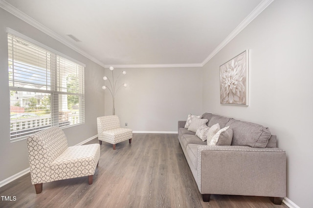 1211 Whispering Oak Ln, Durham, NC 27704 - living room featuring ornamental molding, baseboards, and wood finished floors
