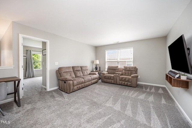 1211 Whispering Oak Ln, Durham, NC 27704 - carpeted living area with baseboards