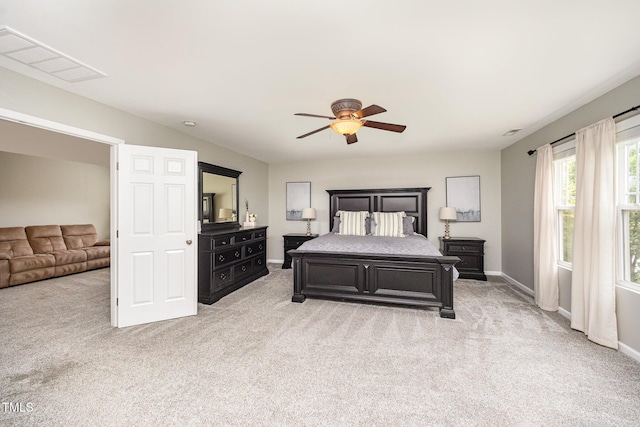 1211 Whispering Oak Ln, Durham, NC 27704 - bedroom featuring light colored carpet, baseboards, and ceiling fan