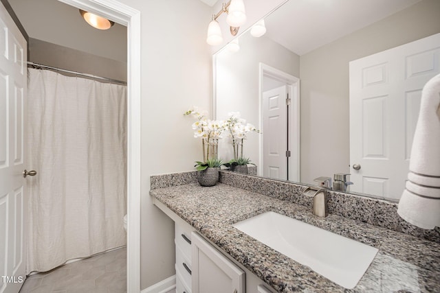 1211 Whispering Oak Ln, Durham, NC 27704 - full bath featuring vanity, toilet, and curtained shower