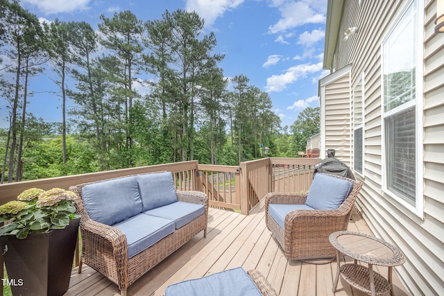 1211 Whispering Oak Ln, Durham, NC 27704 - wooden deck with an outdoor hangout area and view of scattered trees