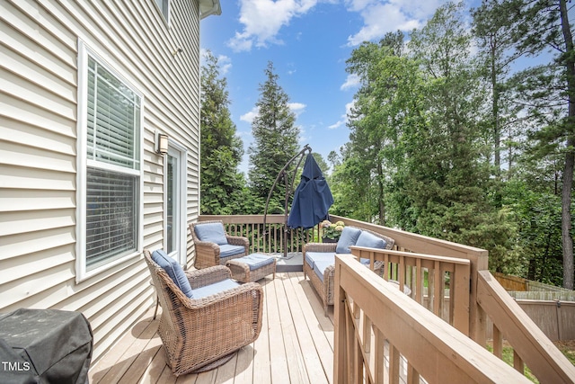 1211 Whispering Oak Ln, Durham, NC 27704 - deck with an outdoor living space, a grill, and view of wooded area