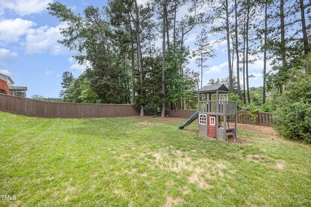 1211 Whispering Oak Ln, Durham, NC 27704 - view of yard with a playground