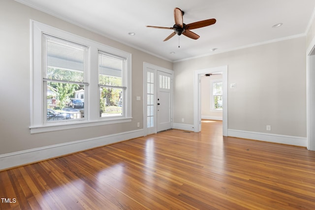 409 N Hyde Park Ave, Durham, NC 27703 - foyer with light wood-style flooring, baseboards, a ceiling fan, and crown molding