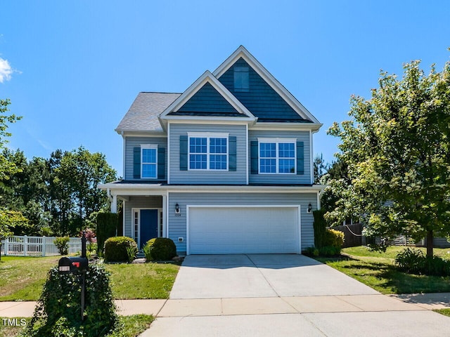 1004 Bridlemine Dr, Fuquay Varina, NC 27526 - view of front of property featuring a garage and concrete driveway