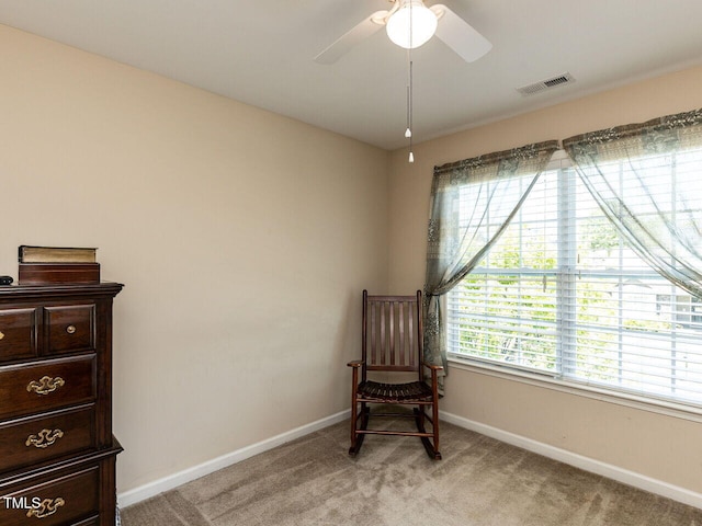 1004 Bridlemine Dr, Fuquay Varina, NC 27526 - sitting room featuring baseboards, light colored carpet, and ceiling fan