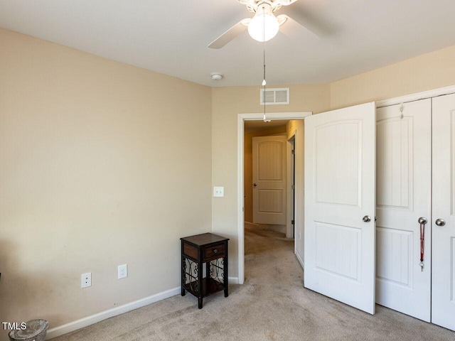 1004 Bridlemine Dr, Fuquay Varina, NC 27526 - unfurnished bedroom featuring light colored carpet, baseboards, a closet, and ceiling fan