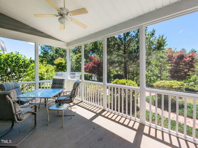 1004 Bridlemine Dr, Fuquay Varina, NC 27526 - sunroom featuring ceiling fan, vaulted ceiling, and outdoor dining area