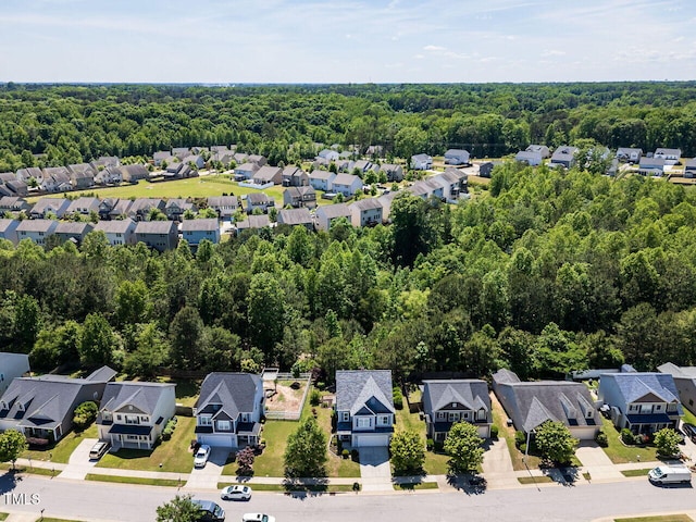 1004 Bridlemine Dr, Fuquay Varina, NC 27526 - aerial view of residential area with a heavily wooded area