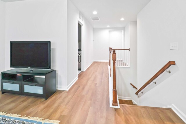 1021 Benay Rd, Morrisville, NC 27560 - corridor with an upstairs landing, wood finished floors, baseboards, and recessed lighting