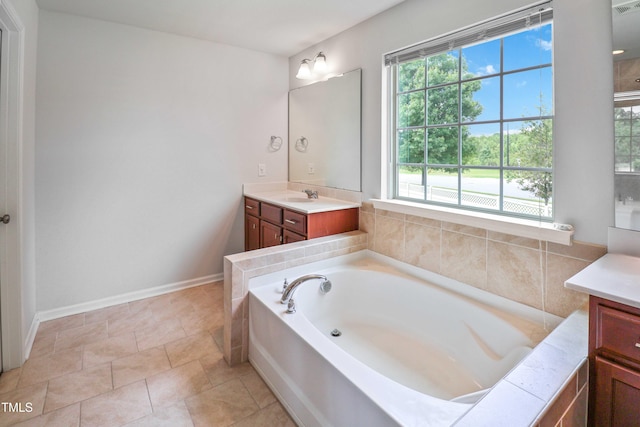1021 Benay Rd, Morrisville, NC 27560 - bathroom featuring vanity, a bath, and baseboards