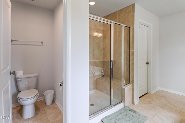 1021 Benay Rd, Morrisville, NC 27560 - full bath featuring toilet, a stall shower, tile patterned floors, and baseboards