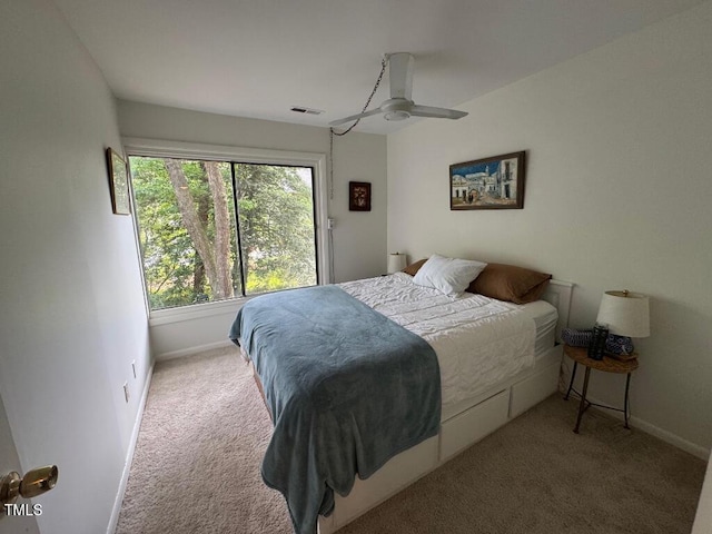 1708 Quail Ridge Rd, Raleigh, NC 27609 - carpeted bedroom featuring baseboards and a ceiling fan