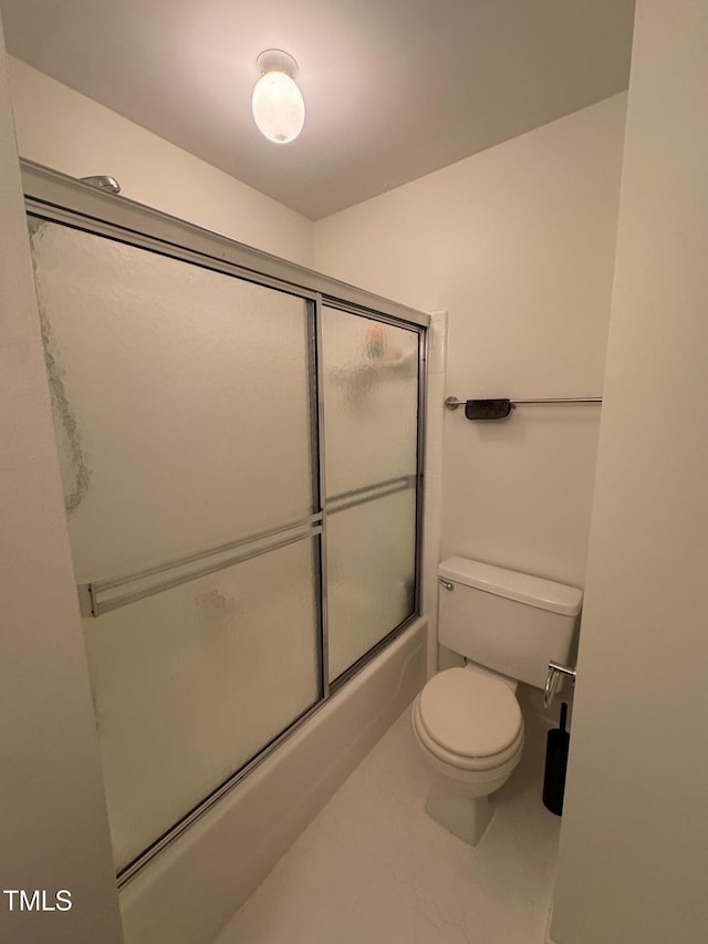 1708 Quail Ridge Rd, Raleigh, NC 27609 - bathroom with toilet and combined bath / shower with glass door