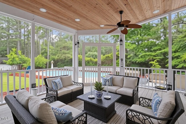 1817 Foxbrook Dr, Raleigh, NC 27603 - sunroom with a ceiling fan, an outdoor living space, and view of wooded area