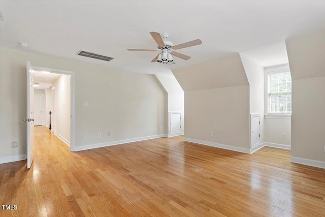 1817 Foxbrook Dr, Raleigh, NC 27603 - additional living space with light wood finished floors, ceiling fan, baseboards, and vaulted ceiling