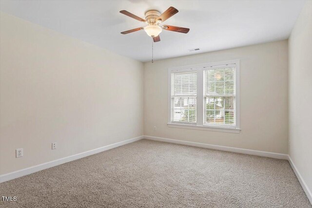 1817 Foxbrook Dr, Raleigh, NC 27603 - unfurnished room with light colored carpet, ceiling fan, and baseboards