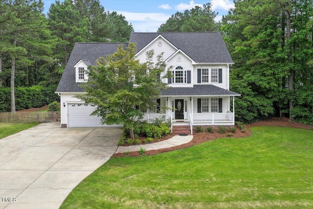 1817 Foxbrook Dr, Raleigh, NC 27603 - colonial house with a porch, driveway, an attached garage, and roof with shingles