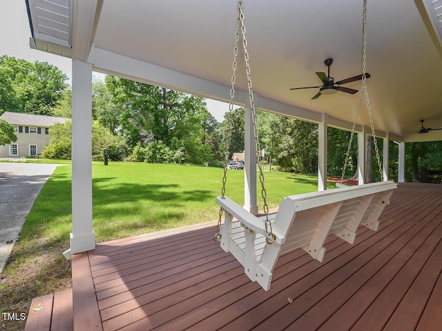 1215 Brookgreen Dr, Cary, NC 27511 - wooden deck with ceiling fan, a lawn, and view of scattered trees