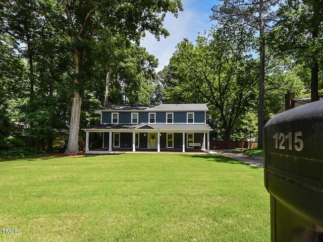 1215 Brookgreen Dr, Cary, NC 27511 - colonial home featuring a porch