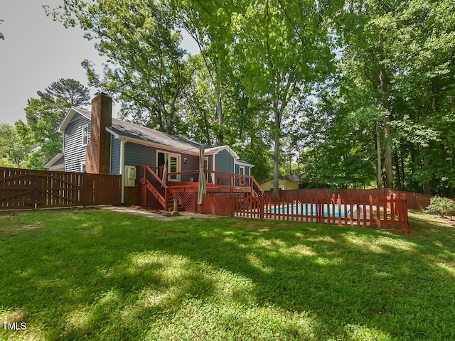 1215 Brookgreen Dr, Cary, NC 27511 - view of yard featuring a deck and stairway