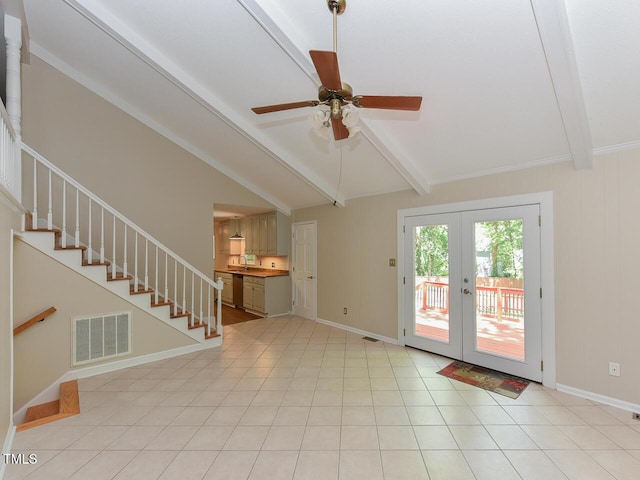 1215 Brookgreen Dr, Cary, NC 27511 - unfurnished living room with stairway, french doors, a ceiling fan, and baseboards