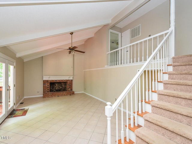 1215 Brookgreen Dr, Cary, NC 27511 - unfurnished living room with ceiling fan, stairs, a brick fireplace, and baseboards