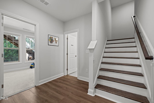 98 Stone Bridge Xing Unit 98, Chapel Hill, NC 27517 - staircase with wood finished floors and baseboards