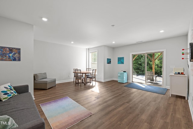 98 Stone Bridge Xing Unit 98, Chapel Hill, NC 27517 - living area with wood finished floors, healthy amount of natural light, recessed lighting, and baseboards