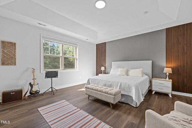 98 Stone Bridge Xing Unit 98, Chapel Hill, NC 27517 - bedroom featuring wood finished floors, a raised ceiling, and baseboards