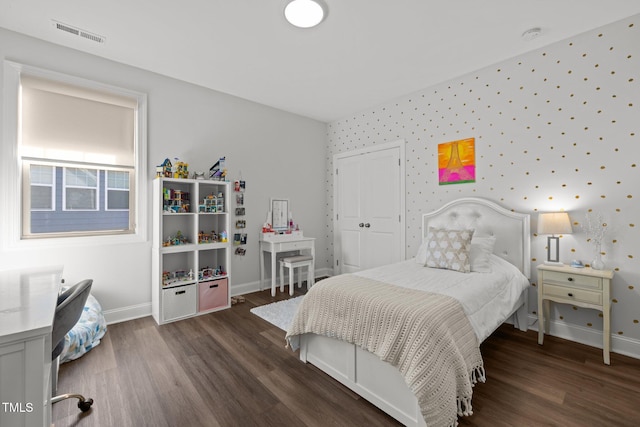 98 Stone Bridge Xing Unit 98, Chapel Hill, NC 27517 - bedroom featuring wallpapered walls, baseboards, wood finished floors, and a closet