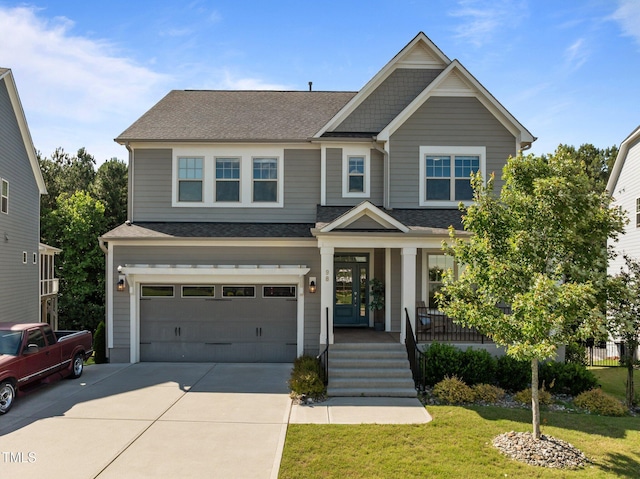 98 Stone Bridge Xing Unit 98, Chapel Hill, NC 27517 - craftsman inspired home featuring a porch, concrete driveway, roof with shingles, and an attached garage