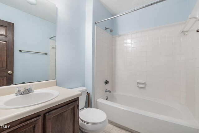6516 Hearthstone Dr Unit 6516, Raleigh, NC 27615 - bathroom featuring toilet, vanity, bathtub / shower combination, and tile patterned flooring