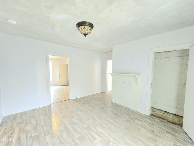 1109 N George St, Goldsboro, NC 27530 - unfurnished living room featuring light wood finished floors
